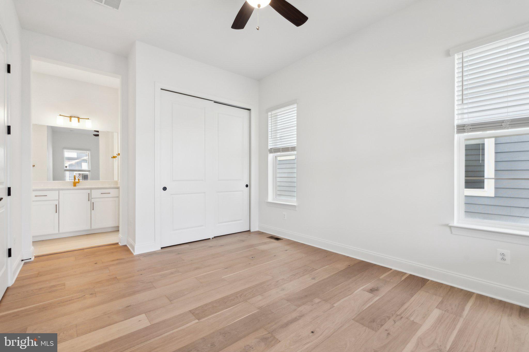 107 Bittern Ct Lake Front Royal, VA 22630 - Photo 29 of 65 wooden floor in an empty room with a window