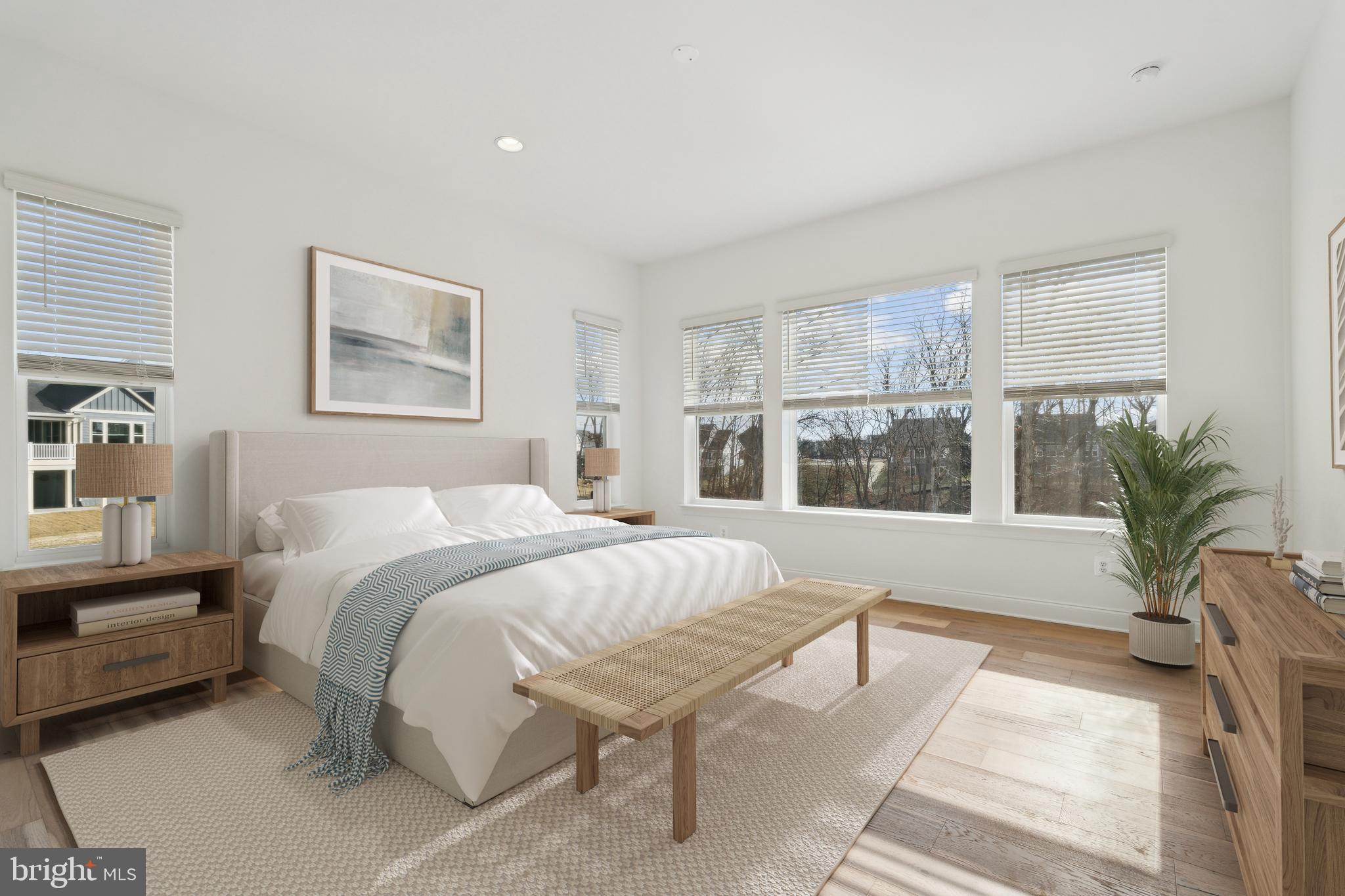 107 Bittern Ct Lake Front Royal, VA 22630 - Photo 5 of 65 a spacious bedroom with a large bed and a large window