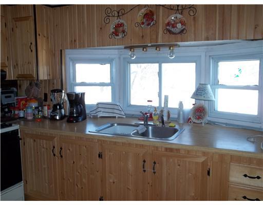 149 Ripley Road Dexter, ME 04930 - Photo 8 of 24 Kitchen. Kitchen sink and new windows