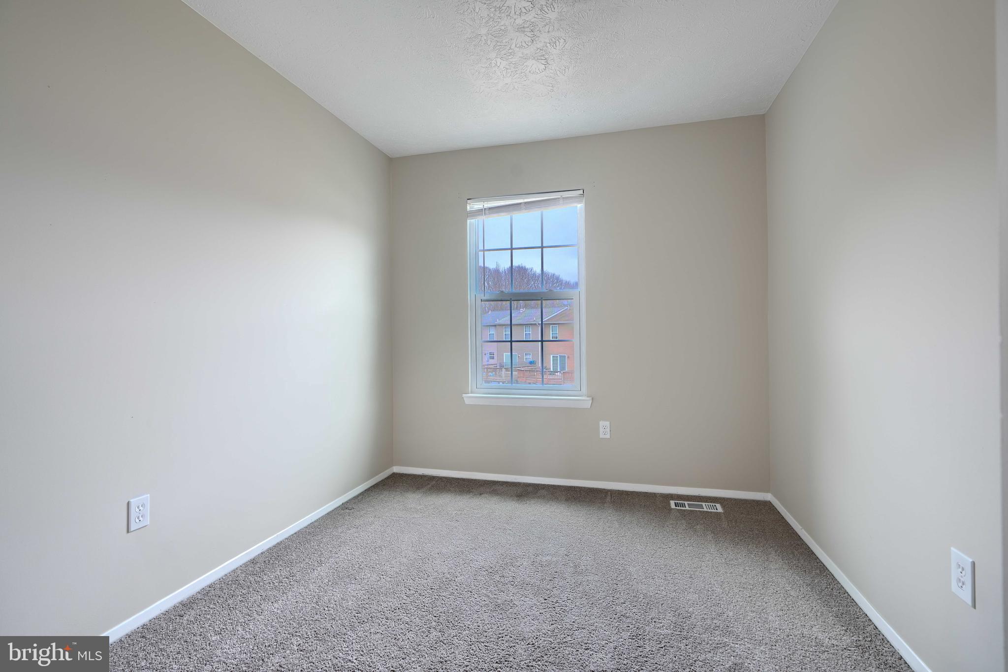 418 Kosoak Road Middle River, MD 21220 - Photo 11 of 25 an empty room with a window