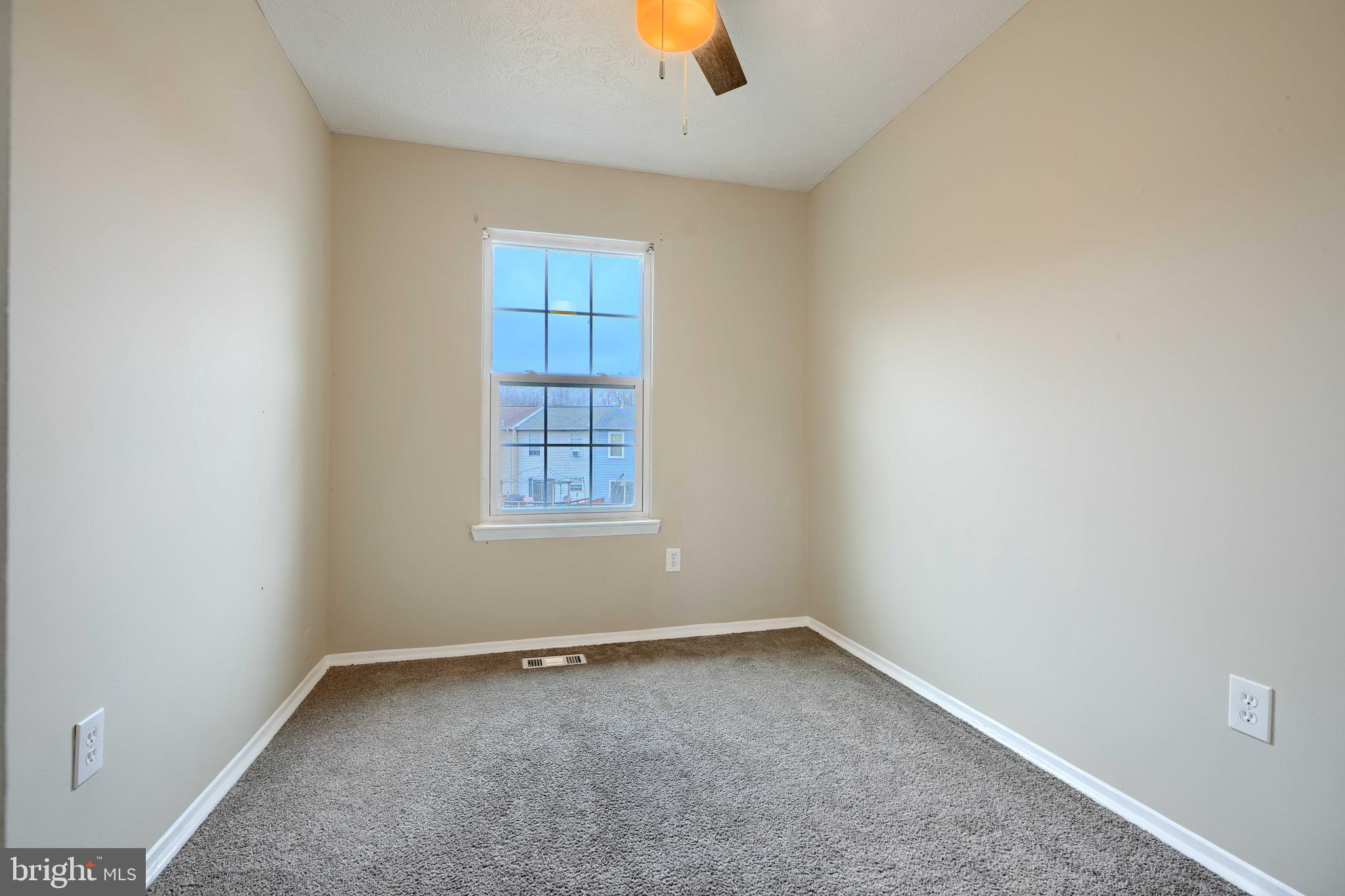 418 Kosoak Road Middle River, MD 21220 - Photo 13 of 25 an empty room with a window