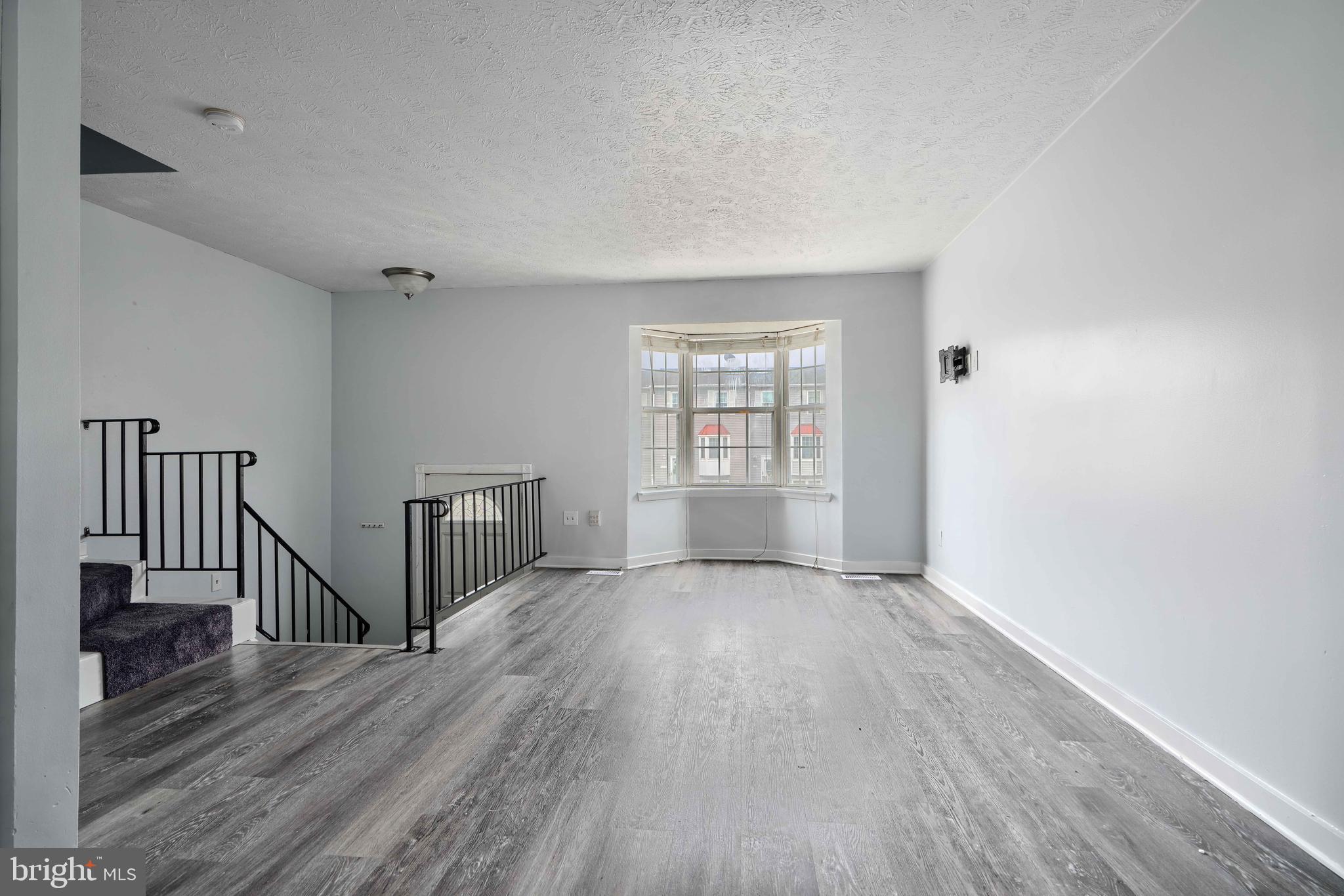 418 Kosoak Road Middle River, MD 21220 - Photo 5 of 25 wooden floor in a hall with an entryway