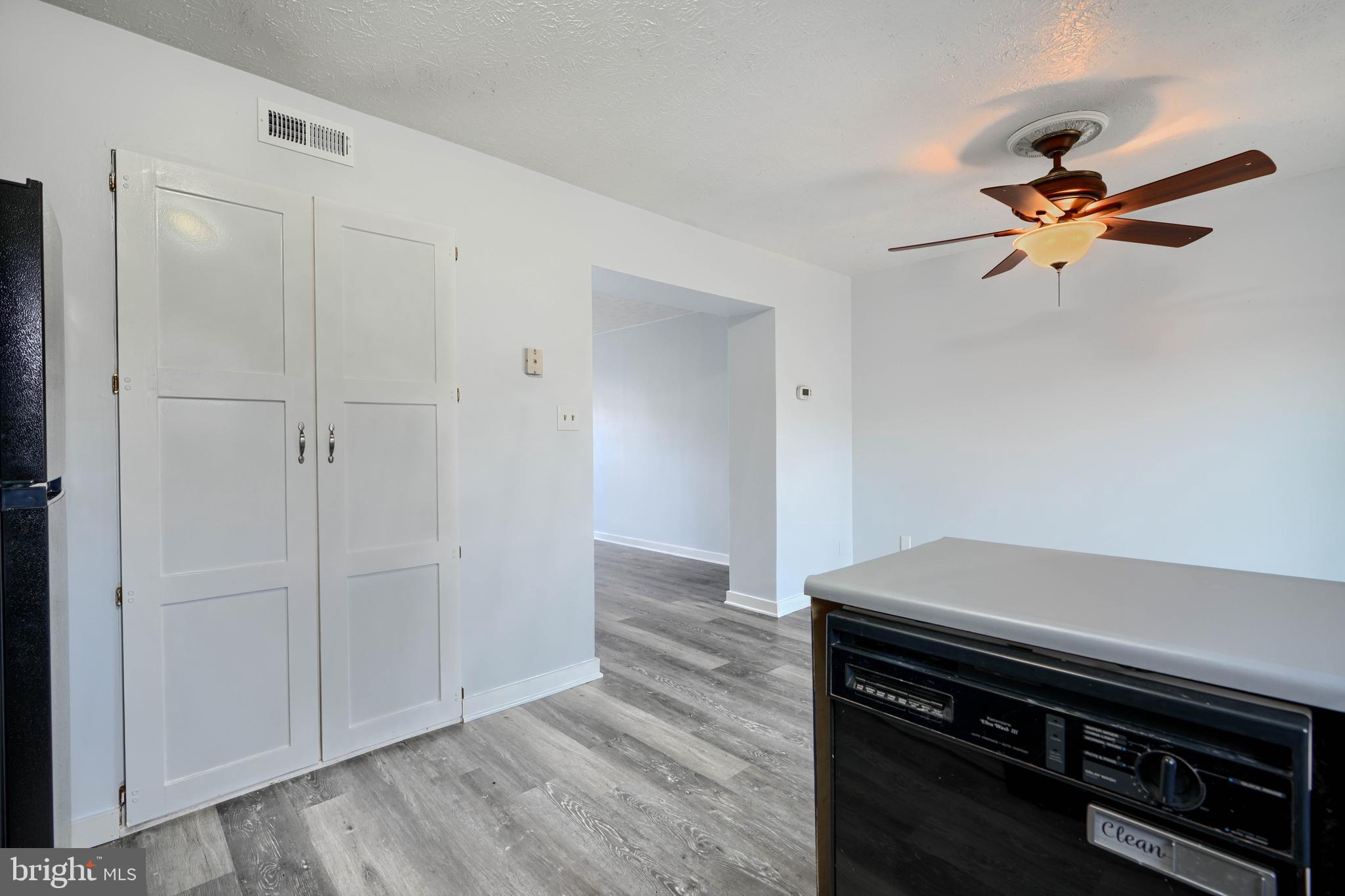 418 Kosoak Road Middle River, MD 21220 - Photo 8 of 25 wooden floor in an empty room