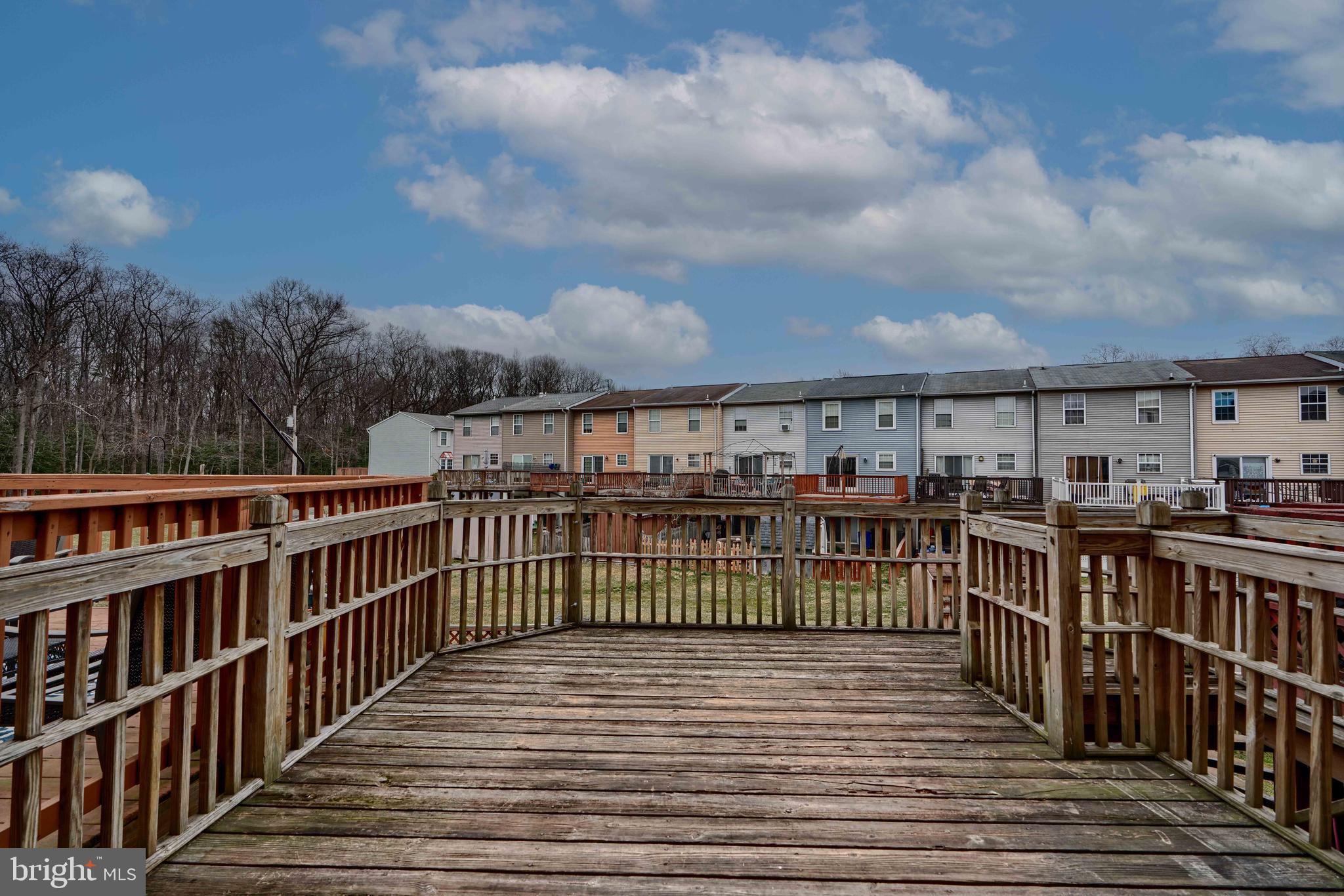 418 Kosoak Road Middle River, MD 21220 - Photo 9 of 25 a view of a balcony with wooden floor