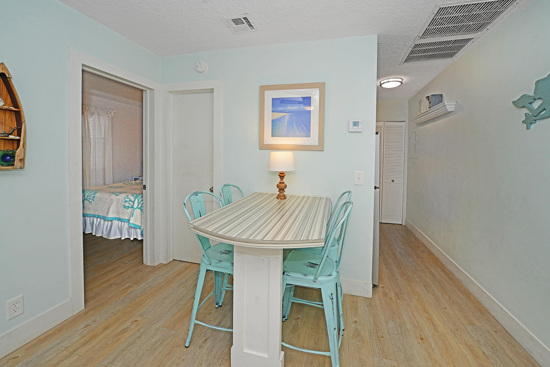 1257 Beach Road Singer Island, FL 33404 - Photo 29 of 71 a view of a livingroom with furniture and wooden floor