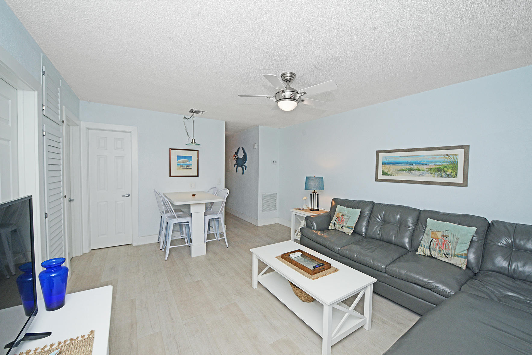 1257 Beach Road Singer Island, FL 33404 - Photo 33 of 71 a living room with furniture and a table