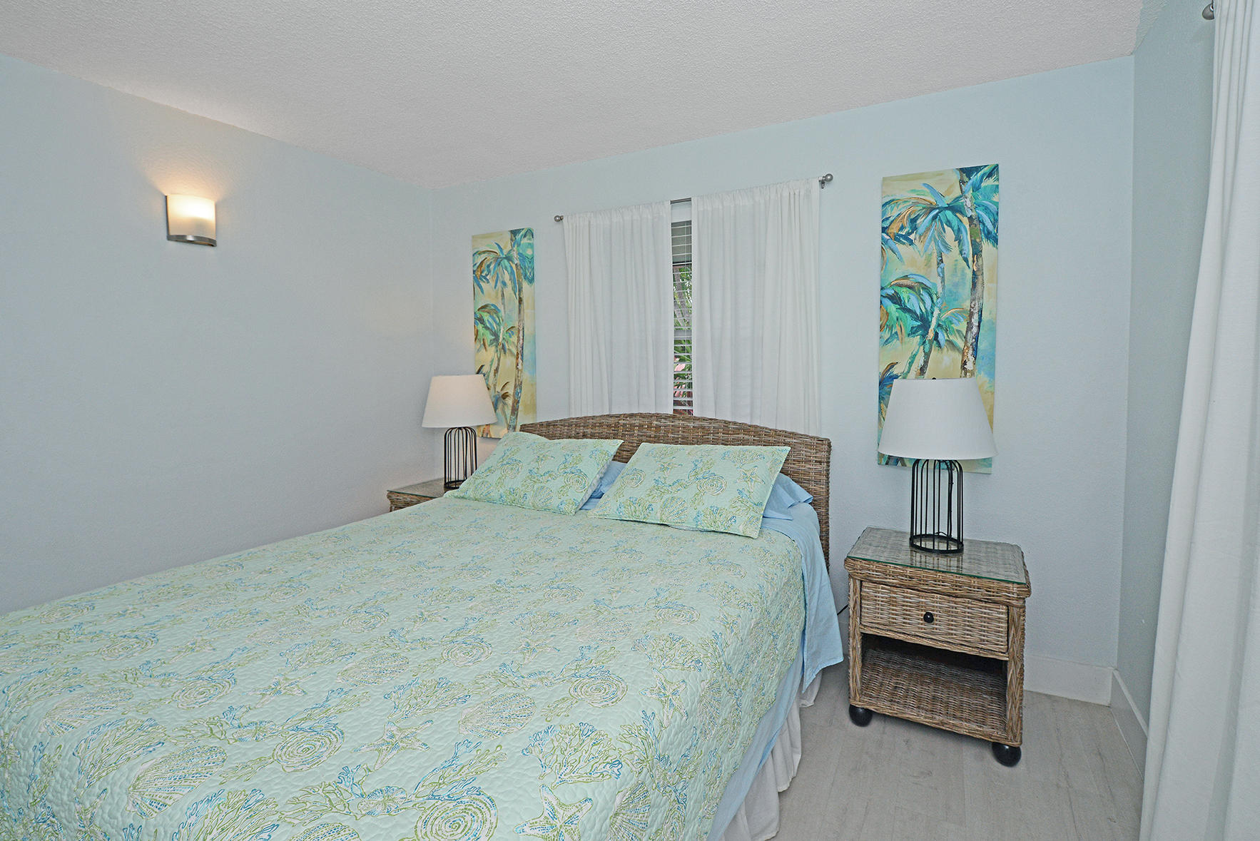 1257 Beach Road Singer Island, FL 33404 - Photo 38 of 71 a bedroom with a bed and a window