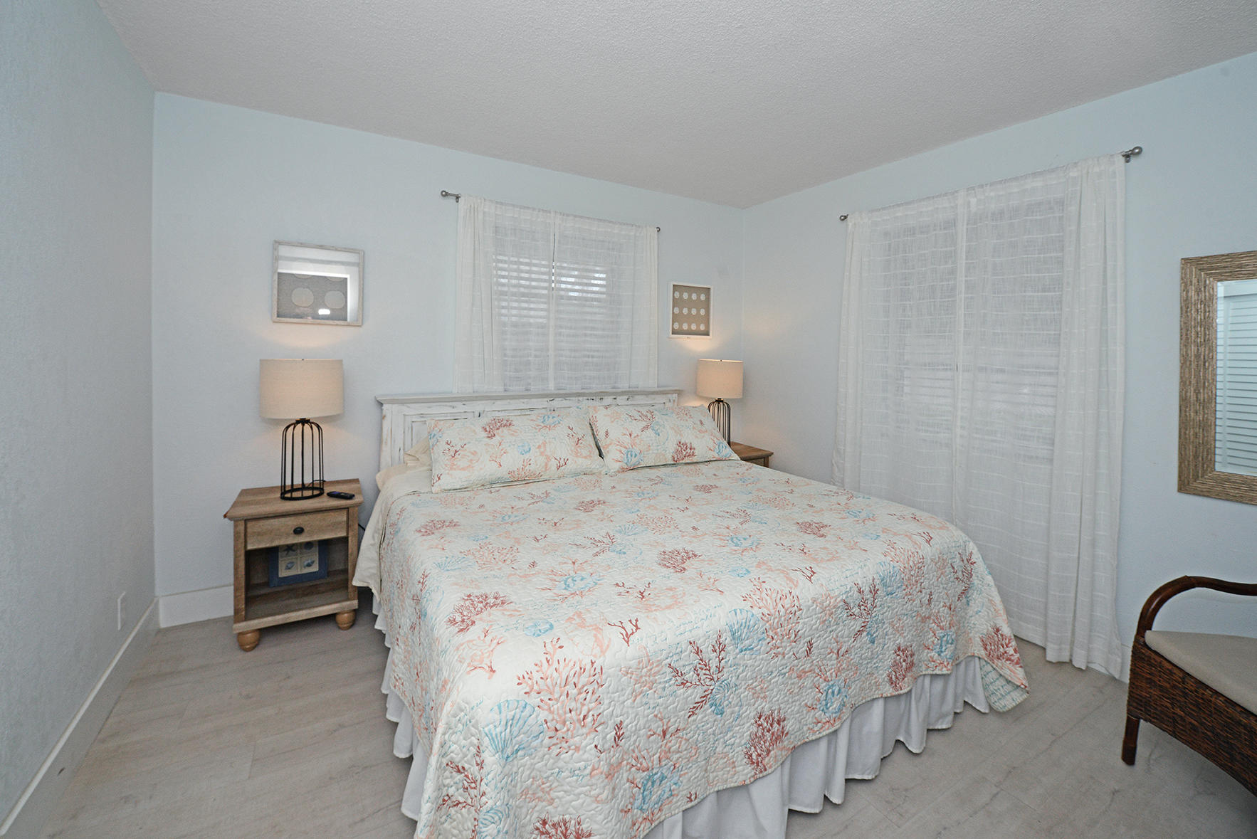 1257 Beach Road Singer Island, FL 33404 - Photo 39 of 71 a bedroom with a bed and a window