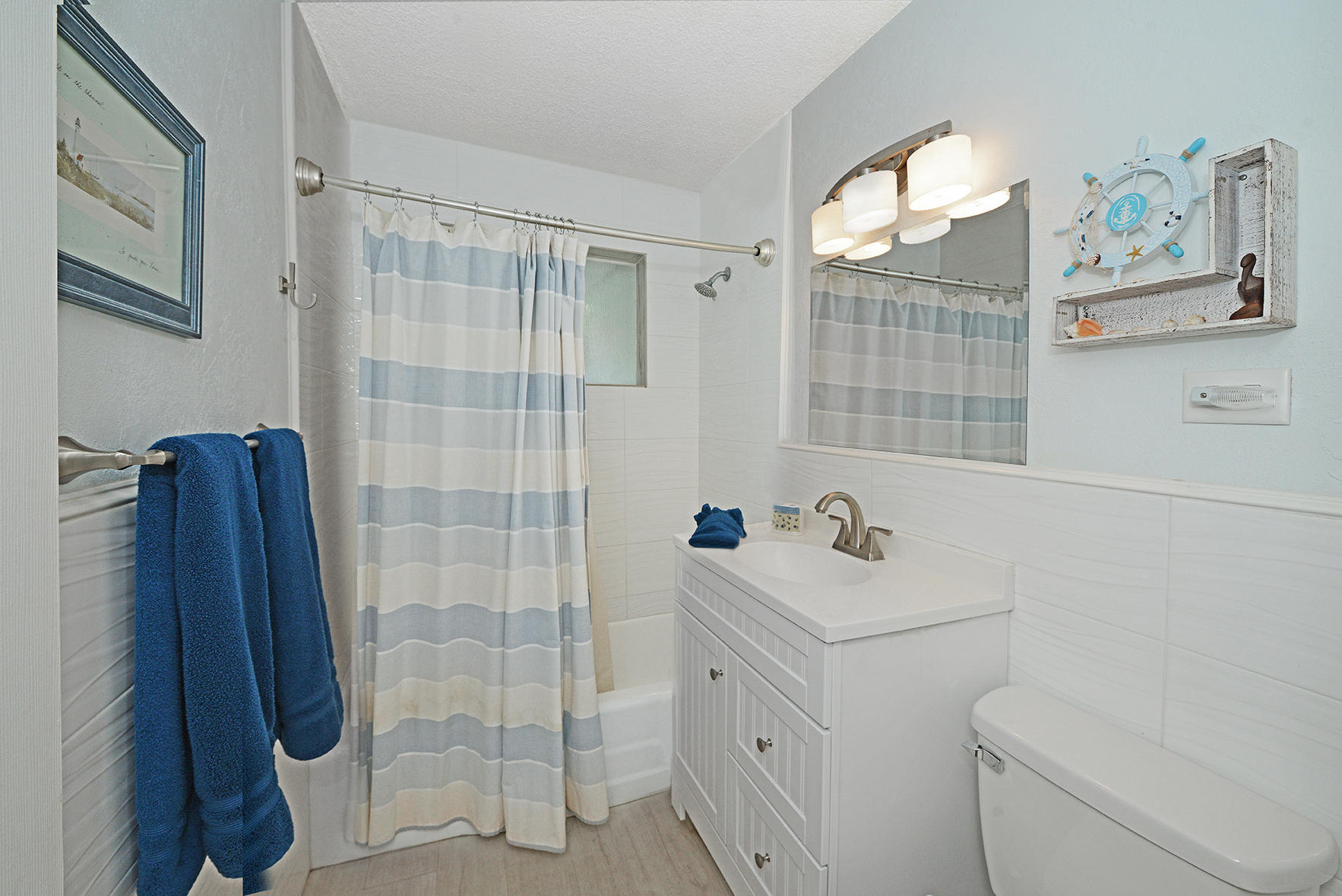 1257 Beach Road Singer Island, FL 33404 - Photo 42 of 71 a bathroom with a sink toilet and shower