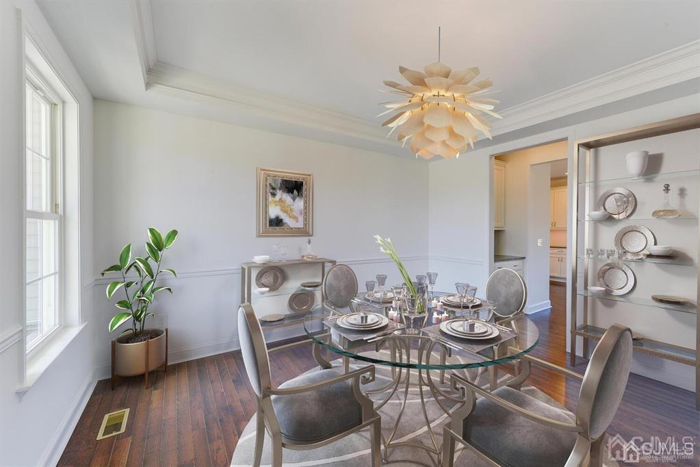 21 May Road East Brunswick, NJ 08816 - Photo 6 of 18 a view of a dining room with furniture window and wooden floor