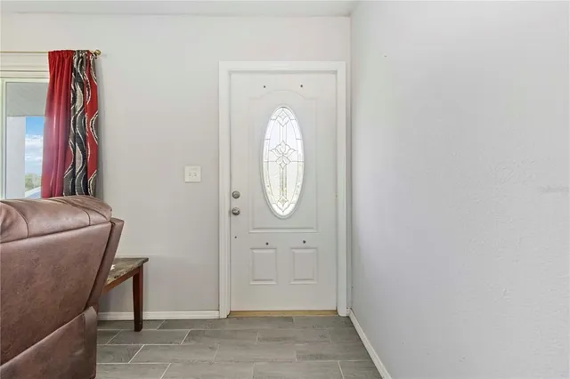 a view of a livingroom with furniture and wooden floor