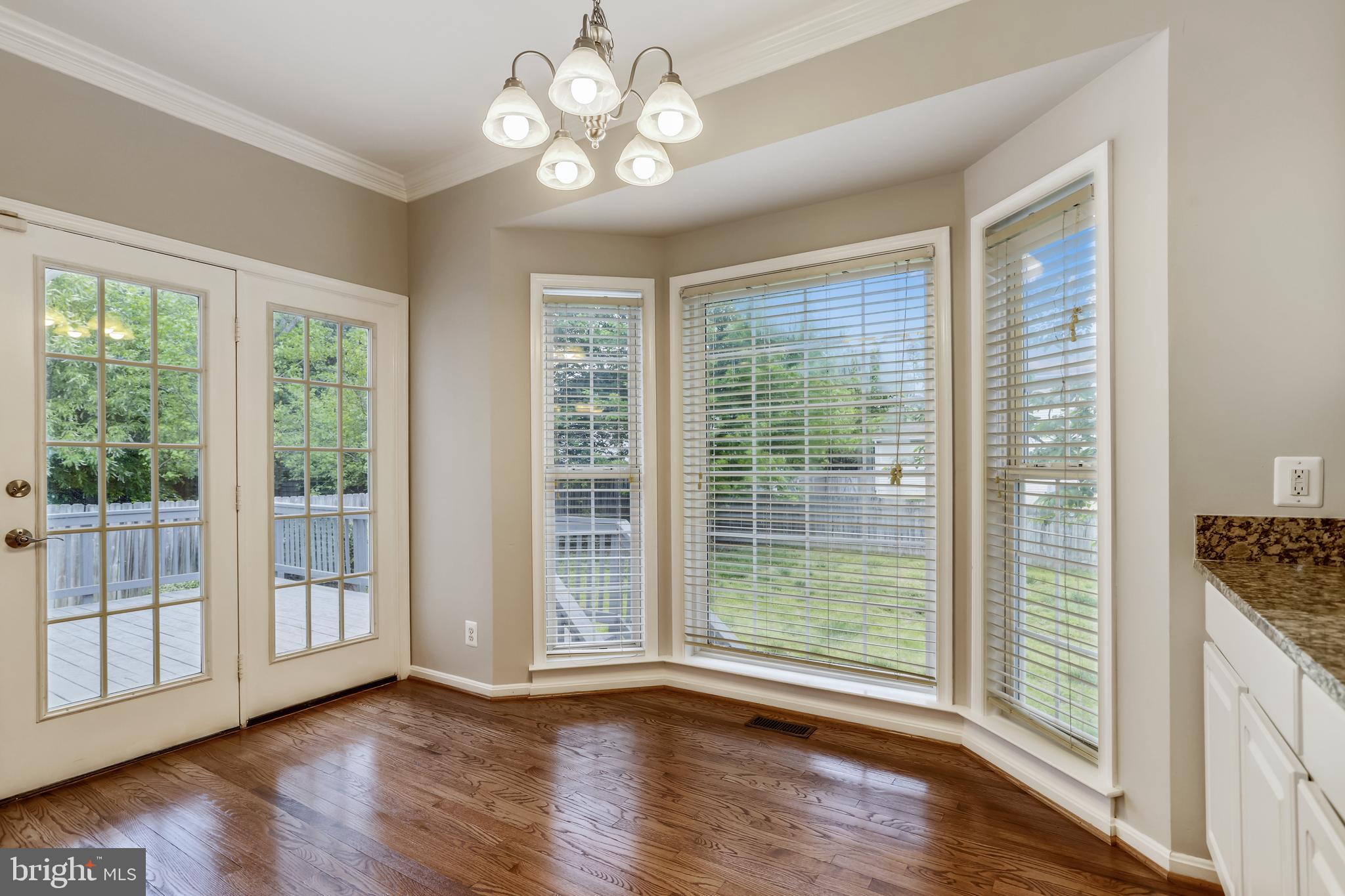 16 Sunset Ridge Lane Fredericksburg, VA 22405 - Photo 12 of 35 a view of empty room with wooden floor and fan