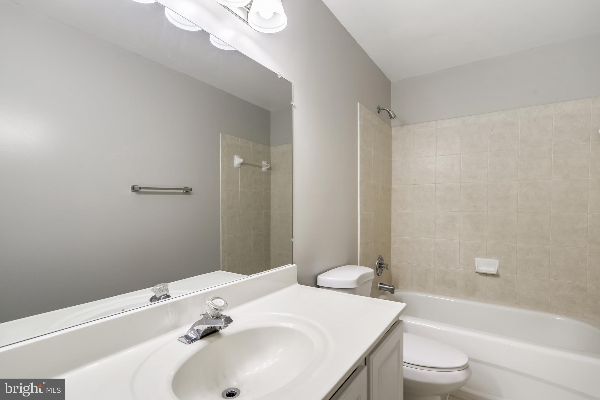 16 Sunset Ridge Lane Fredericksburg, VA 22405 - Photo 21 of 35 a bathroom with a sink a toilet and shower
