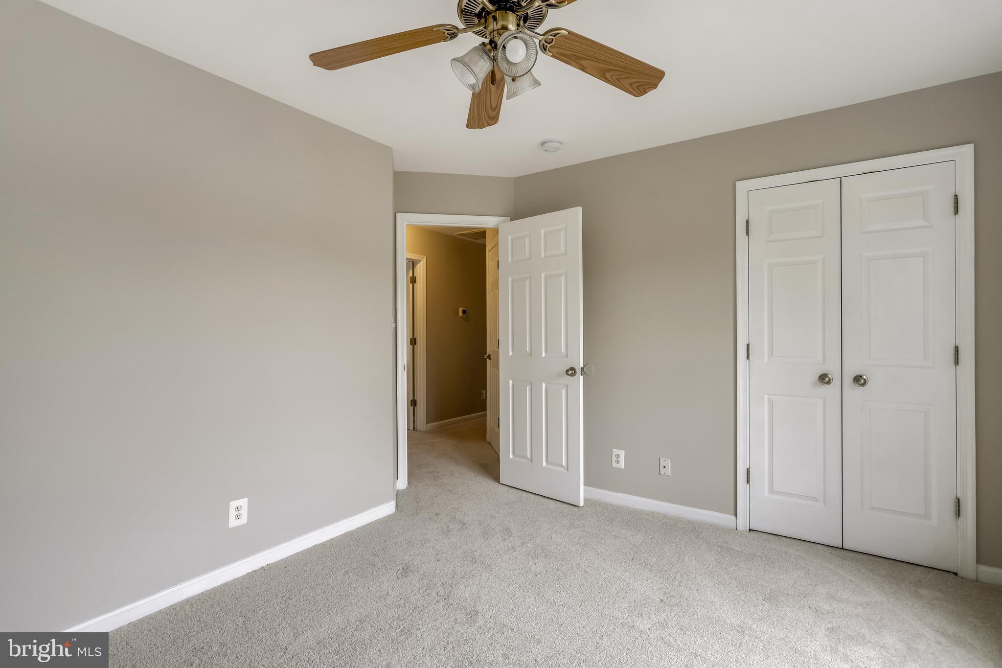 16 Sunset Ridge Lane Fredericksburg, VA 22405 - Photo 23 of 35 a view of an empty room and chandelier fan
