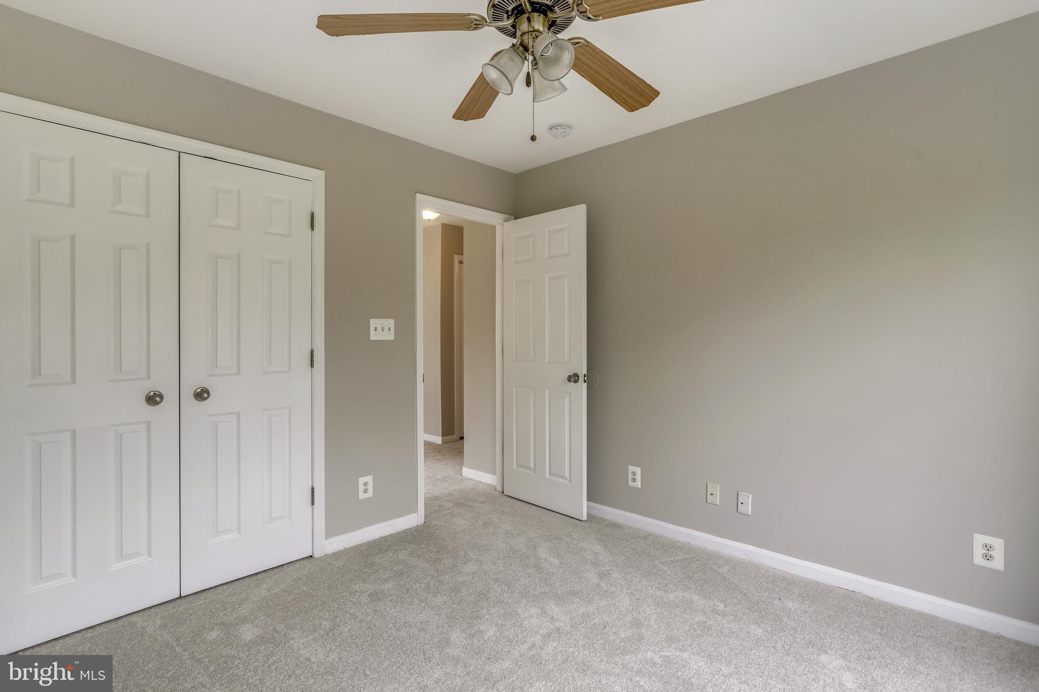 16 Sunset Ridge Lane Fredericksburg, VA 22405 - Photo 24 of 35 a view of an empty room and chandelier fan