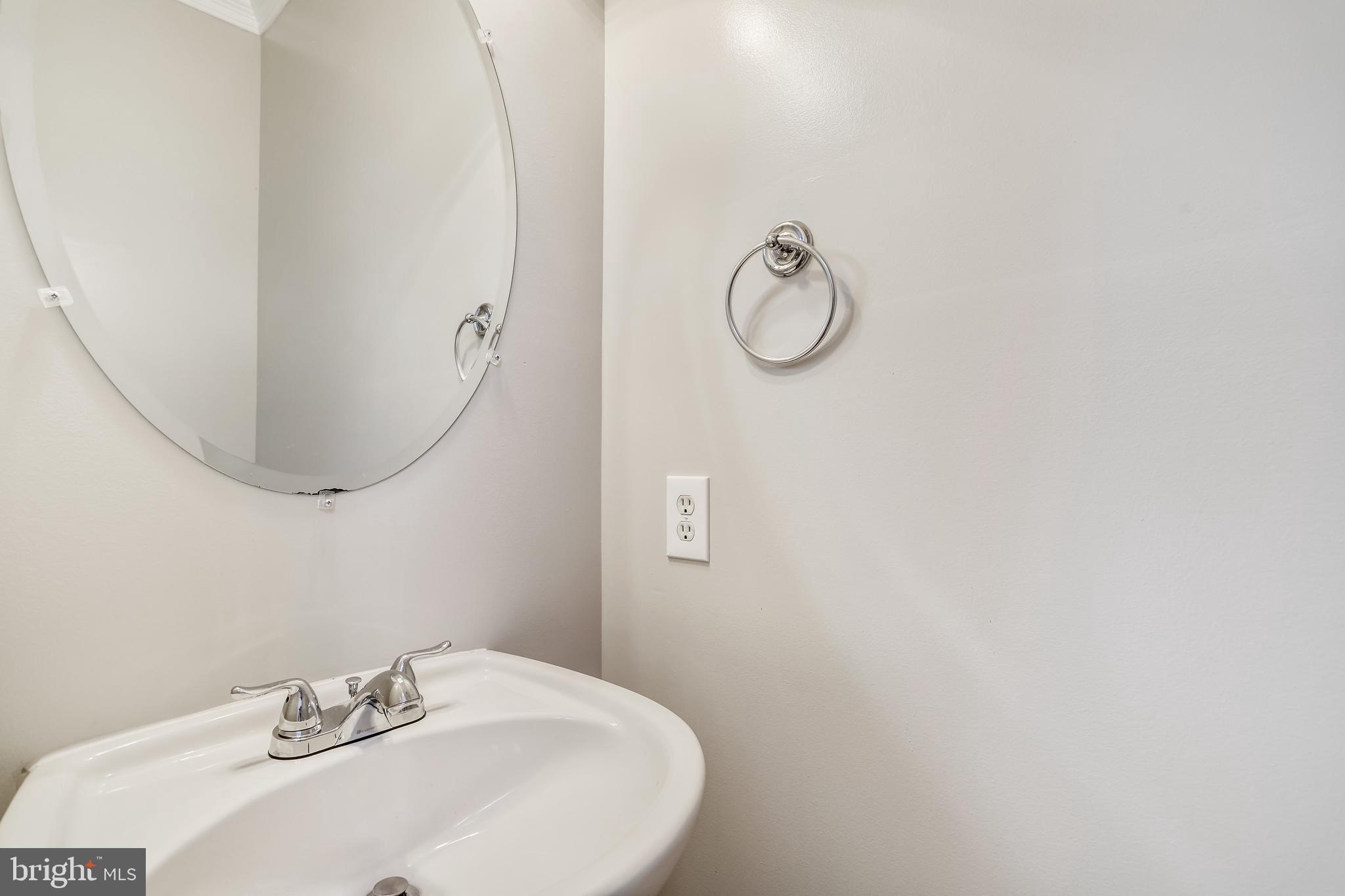 16 Sunset Ridge Lane Fredericksburg, VA 22405 - Photo 33 of 35 a bathroom with a sink and mirror