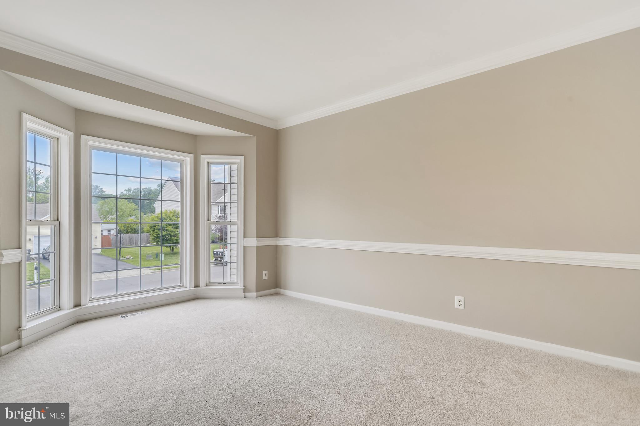 16 Sunset Ridge Lane Fredericksburg, VA 22405 - Photo 6 of 35 a view of an empty room with wooden floor and a window