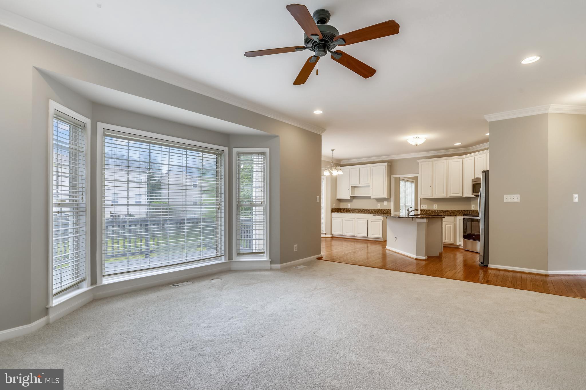 16 Sunset Ridge Lane Fredericksburg, VA 22405 - Photo 9 of 35 a view of a livingroom with a ceiling fan and window