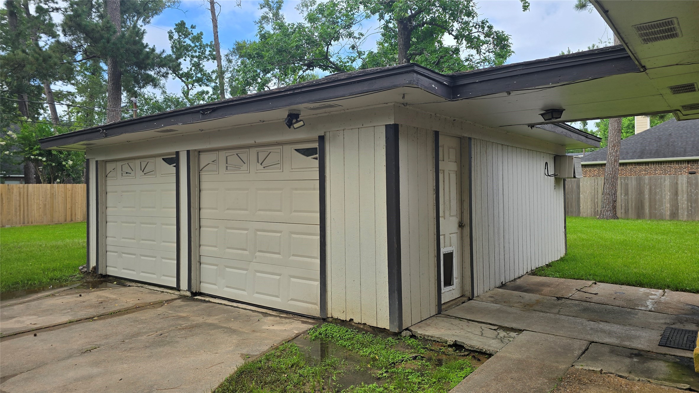 2110 Eagle Point Road Crosby, TX 77532 - Photo 2 of 16 2 car dethatched garage behind a locking gate