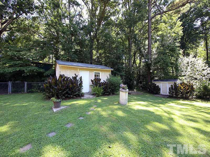 1315 Chaney Road Raleigh, NC 27606 - Photo 23 of 25 Two storage sheds - one with electrical and the other a garden shed for extra storage.