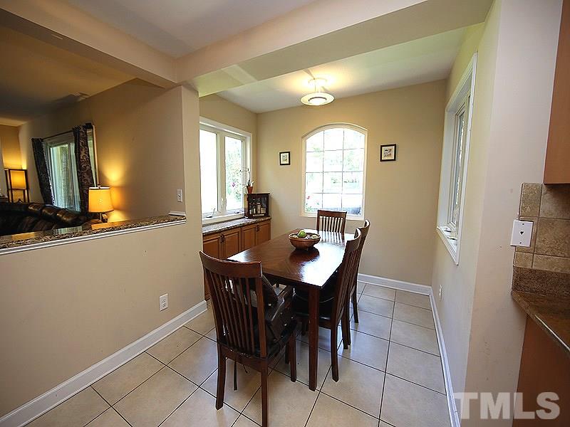 1315 Chaney Road Raleigh, NC 27606 - Photo 10 of 25 Bumped out during the remodel in 2009, this dining space is bright and roomy!