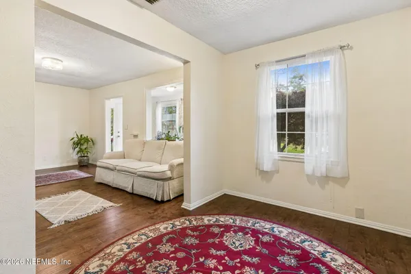 a living room with furniture and a couch