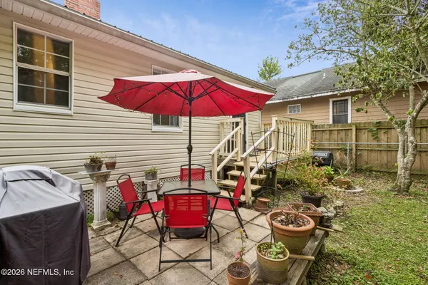 a view of a two chairs in patio