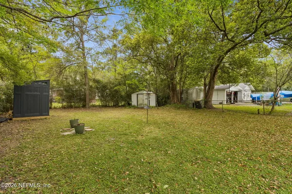 a house with trees in front of it