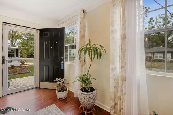 a room with furniture and window