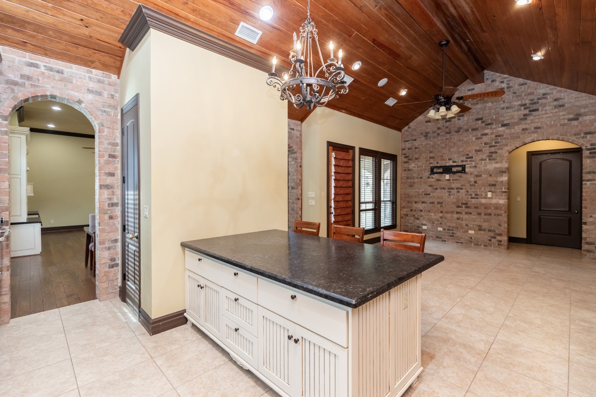 3365 Esplanade Beaumont, TX 77707 - Photo 14 of 33 a kitchen with stainless steel appliances granite countertop a sink a counter space and cabinets