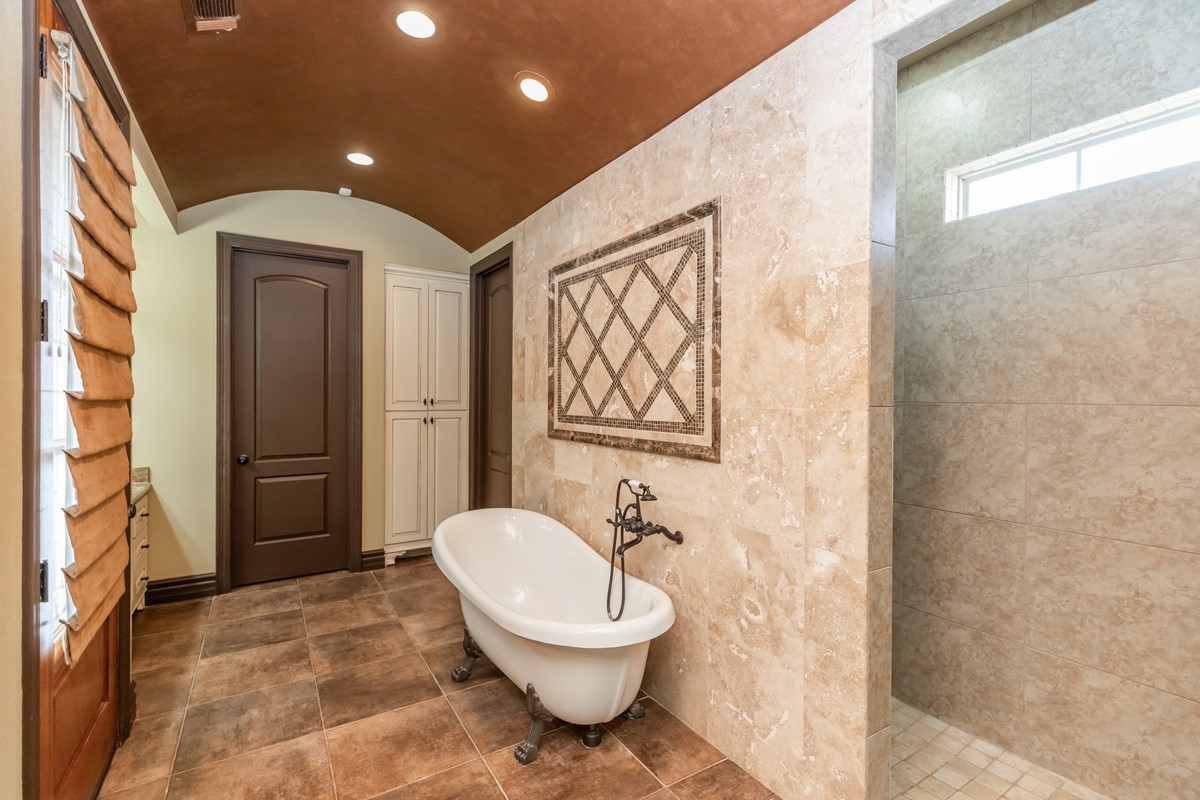 3365 Esplanade Beaumont, TX 77707 - Photo 25 of 33 a bathroom with a toilet sink and shower