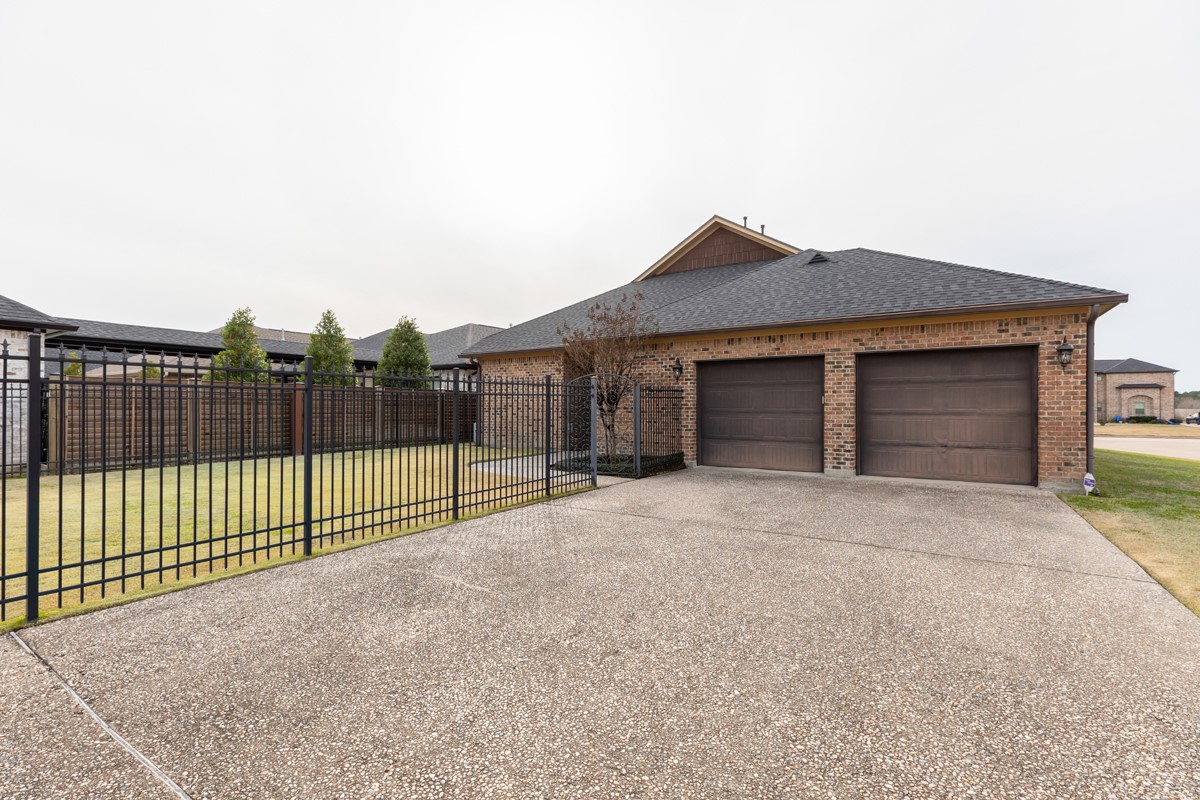 3365 Esplanade Beaumont, TX 77707 - Photo 33 of 33 a view of a house with a garage