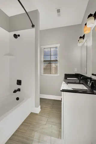 a room that has a sink and a window