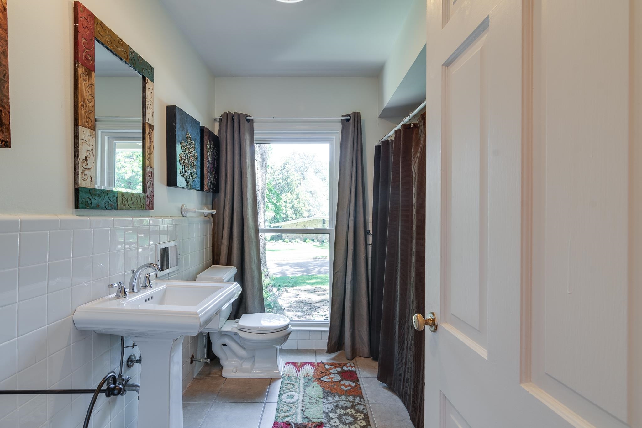 4263 Burgundy Road Memphis, TN 38111 - Photo 24 of 38 Bathroom #2 features tile walls, tile floors and tasteful backsplash.