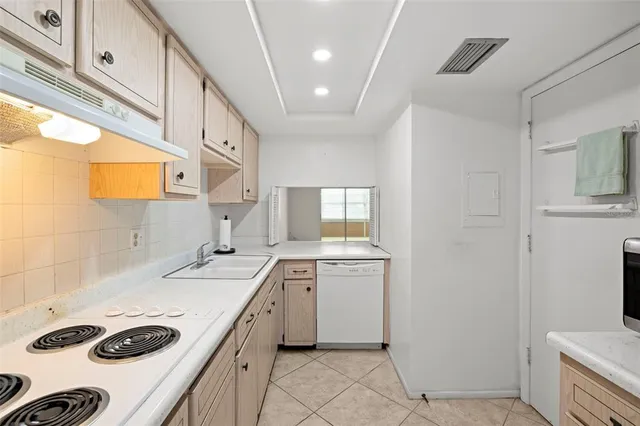a bathroom with a sink a vanity and a mirror