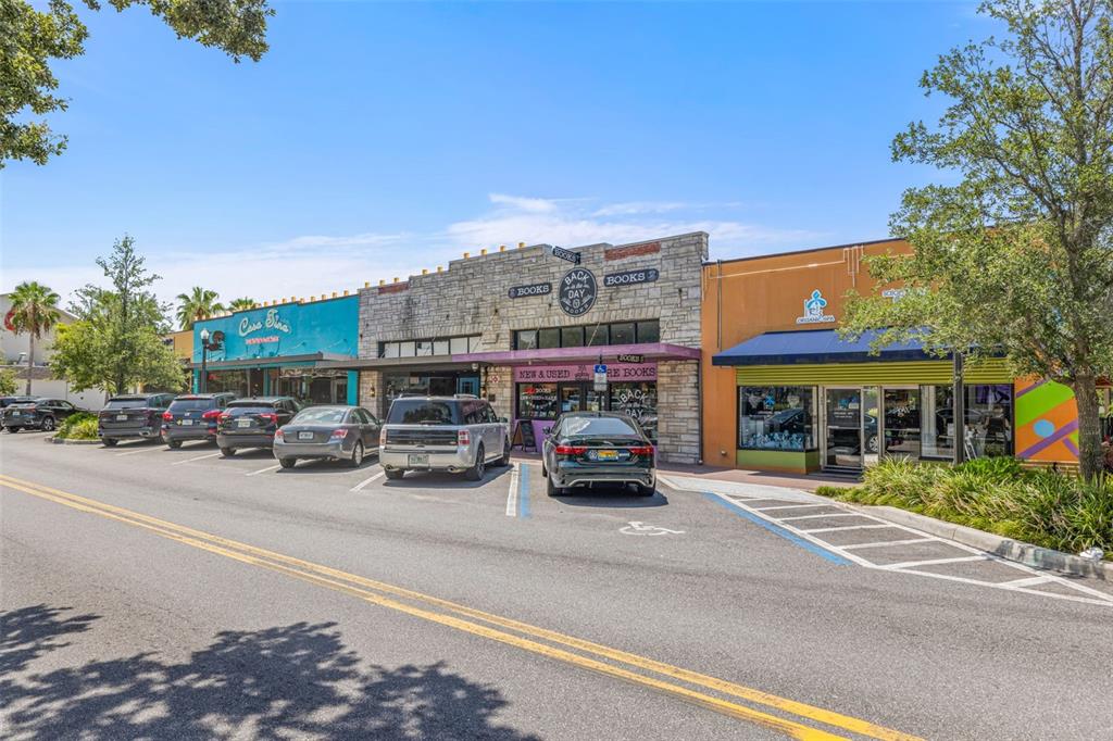 400 Glennes Lane, Unit 206 Dunedin, FL 34698 - Photo 32 of 49 a view of a cars park in front of a building