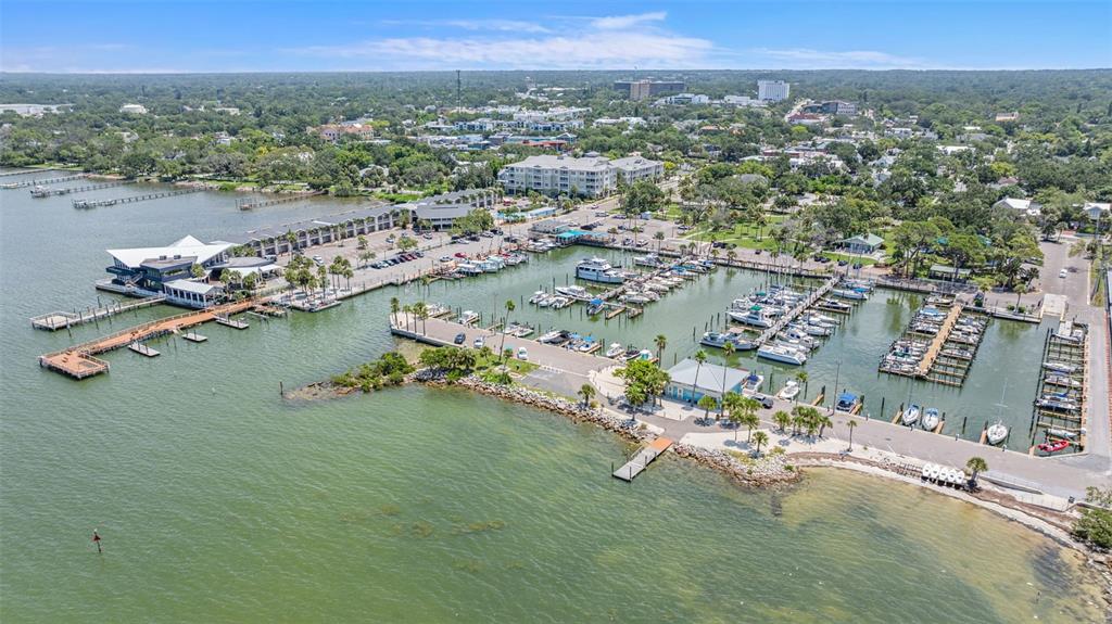 400 Glennes Lane, Unit 206 Dunedin, FL 34698 - Photo 42 of 49 an aerial view of a city with mountains