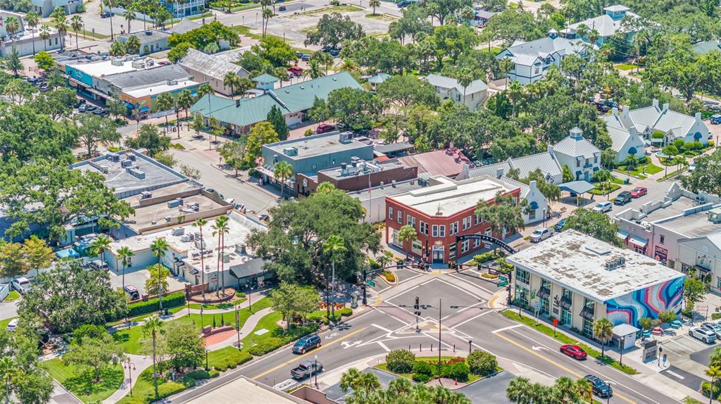 400 Glennes Lane, Unit 206 Dunedin, FL 34698 - Photo 47 of 49 an aerial view of residential houses with outdoor space