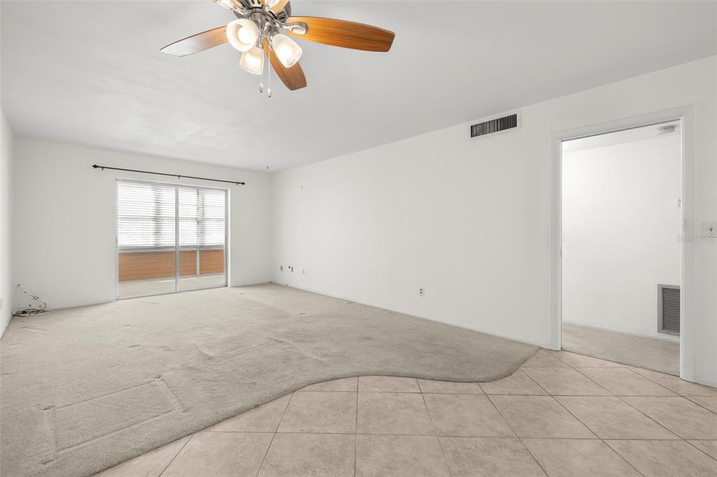400 Glennes Lane, Unit 206 Dunedin, FL 34698 - Photo 5 of 49 a view of empty room with window