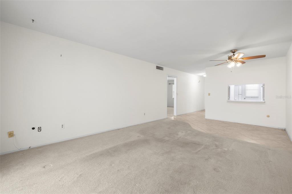 400 Glennes Lane, Unit 206 Dunedin, FL 34698 - Photo 6 of 49 a view of an empty room