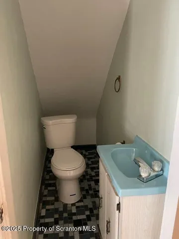 a bathroom with a sink and a toilet