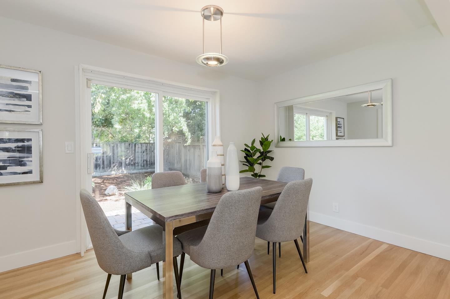 632 Smoke Tree Way Sunnyvale, CA 94086 - Photo 11 of 38 a view of a dining room with furniture window and wooden floor