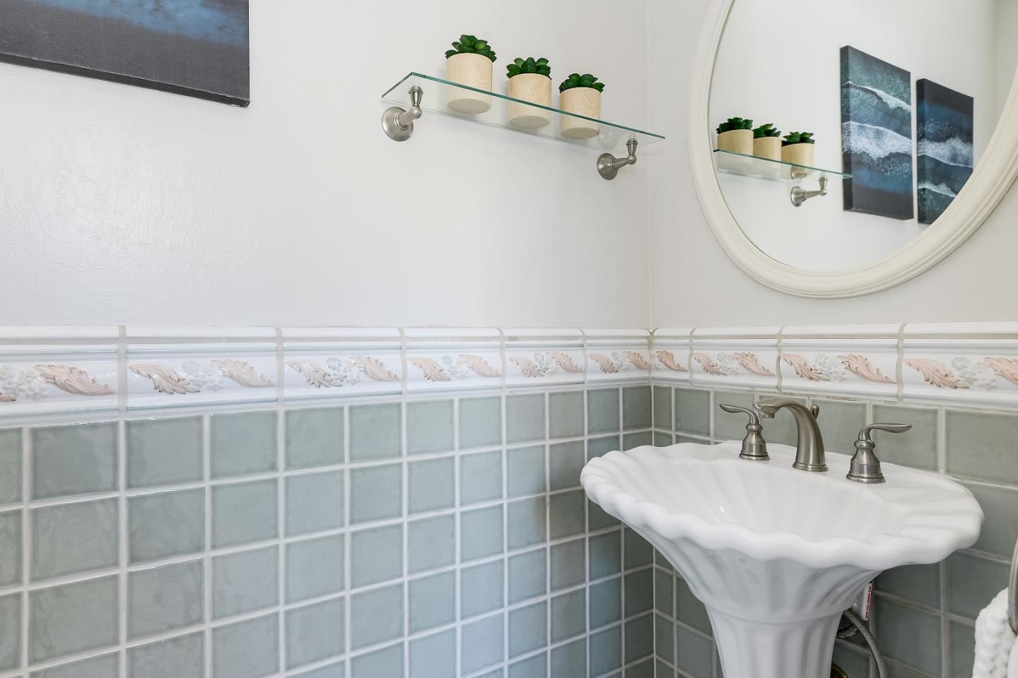 632 Smoke Tree Way Sunnyvale, CA 94086 - Photo 20 of 38 a bathroom with a sink and a mirror