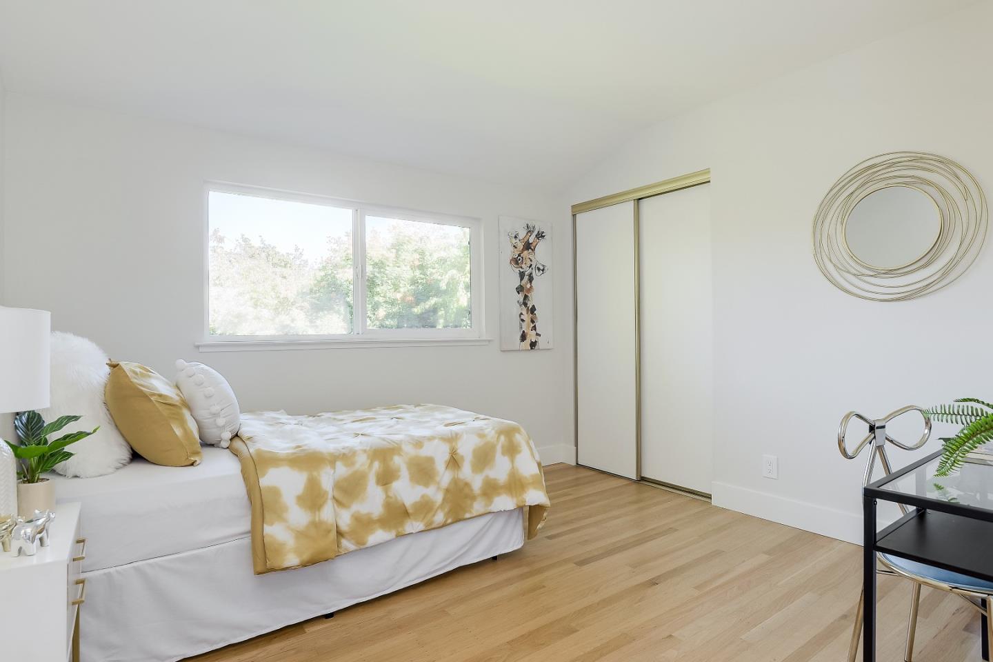 632 Smoke Tree Way Sunnyvale, CA 94086 - Photo 24 of 38 a bedroom with a bed and window