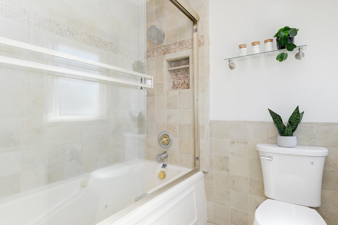 632 Smoke Tree Way Sunnyvale, CA 94086 - Photo 31 of 38 a white bath tub sitting next to a white toilet