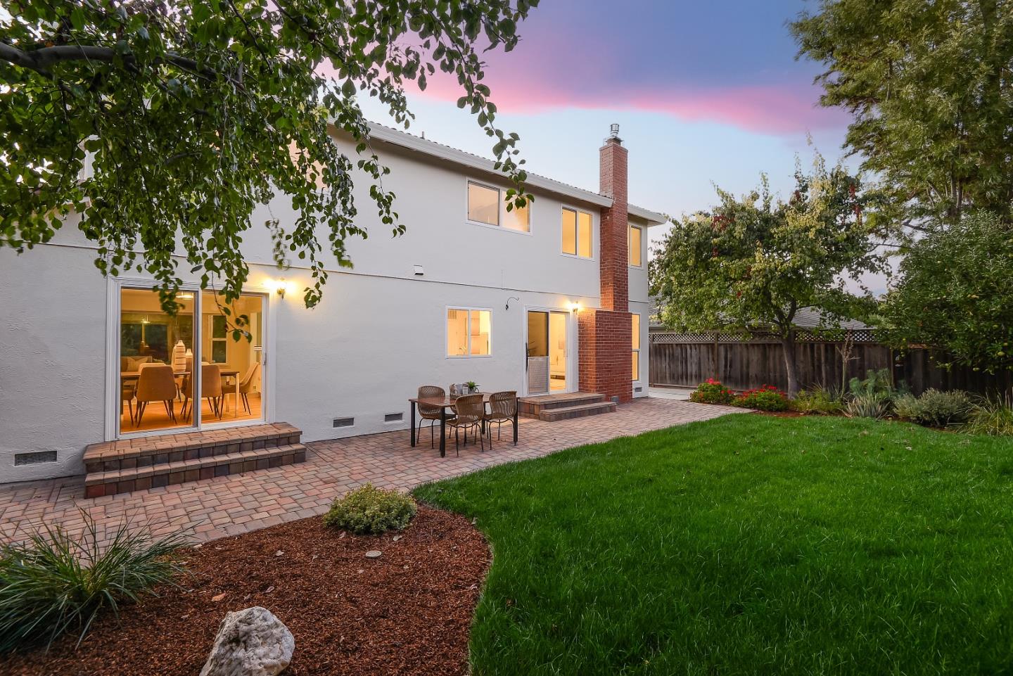 632 Smoke Tree Way Sunnyvale, CA 94086 - Photo 34 of 38 a view of backyard of house with green space and seating area