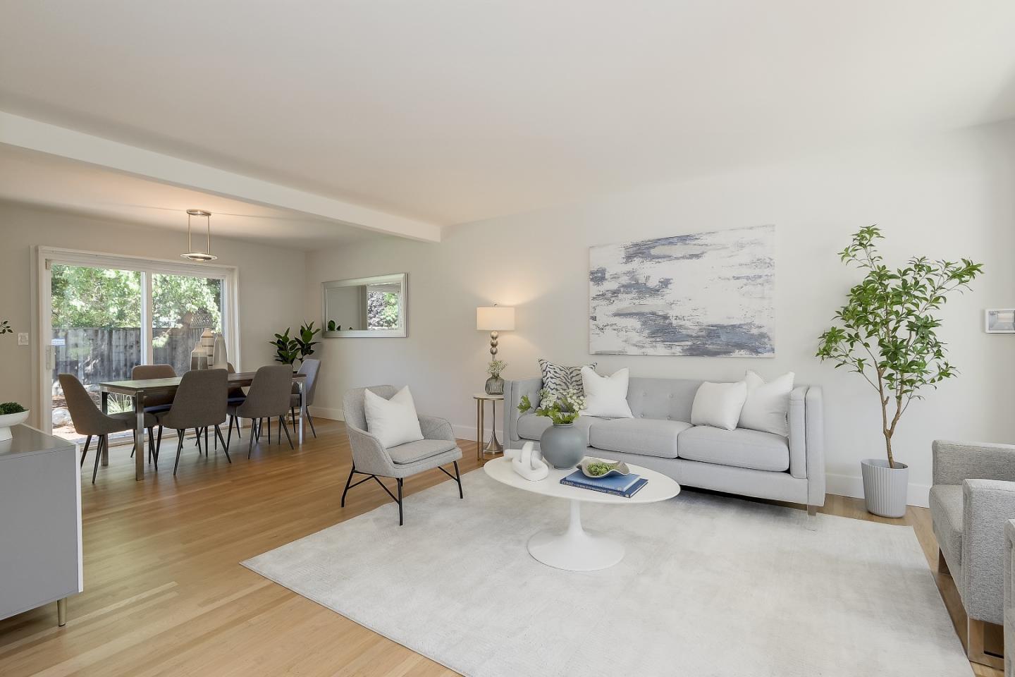 632 Smoke Tree Way Sunnyvale, CA 94086 - Photo 8 of 38 a living room with furniture and a potted plant