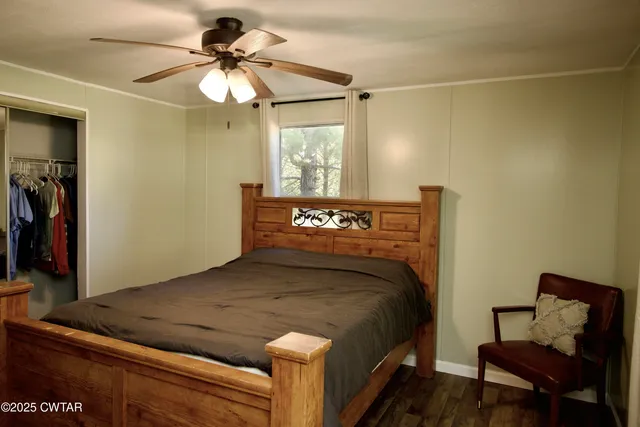 a workspace with wooden floor cabinet and entryway