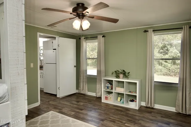 a white bath tub sitting next to a bathroom sink