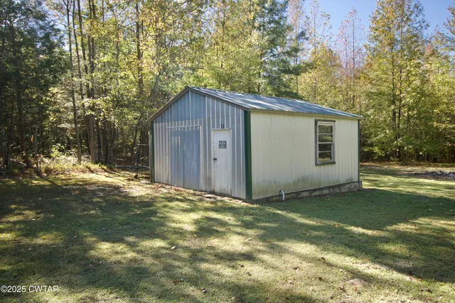 a view of a livingroom with furniture and window